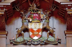 Carved wooden depiction of RCSI Coat of Arms